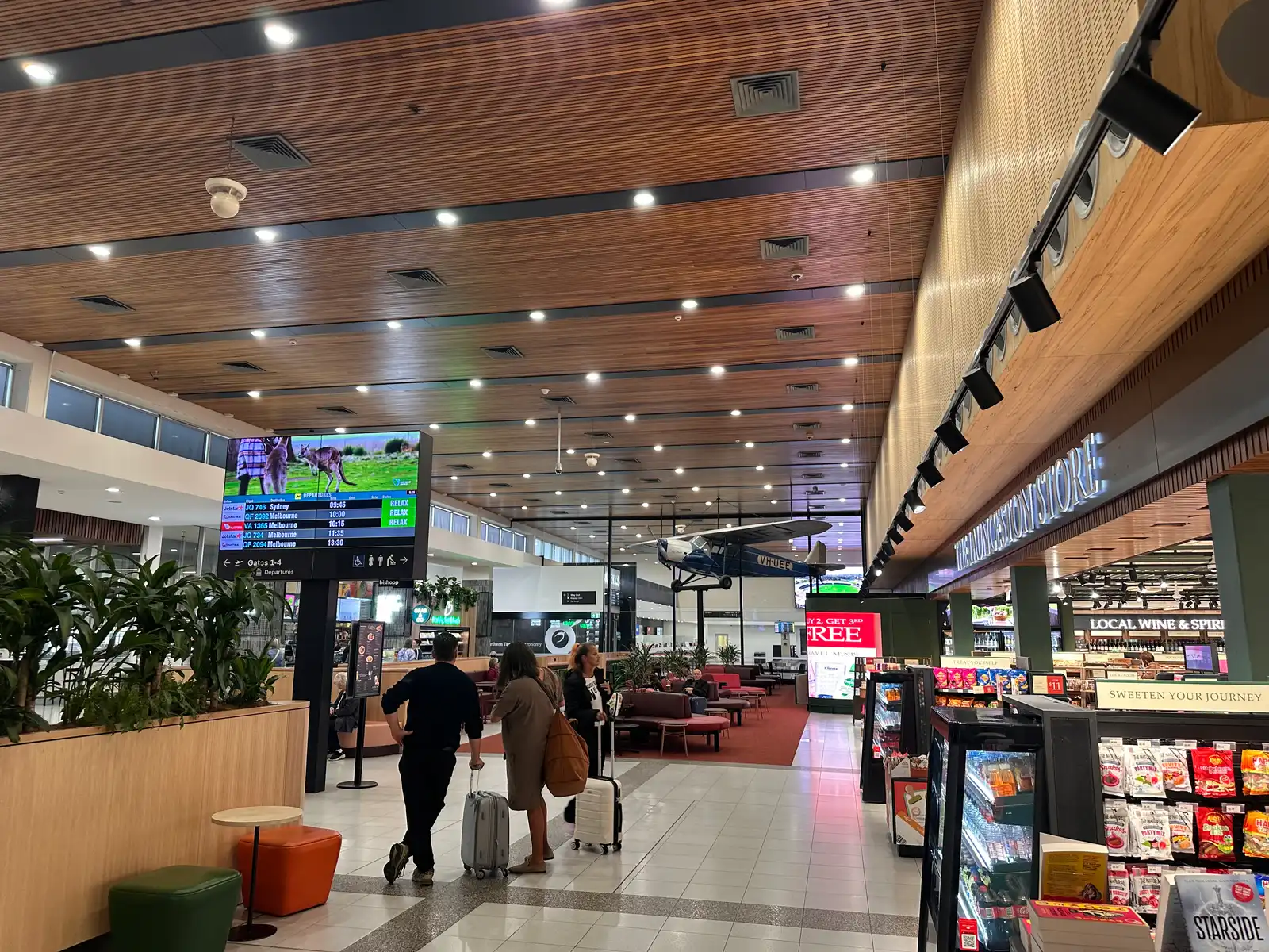 Departures hall with the suspended Miss Flinders monoplane at Launceston Airport, Tasmania
