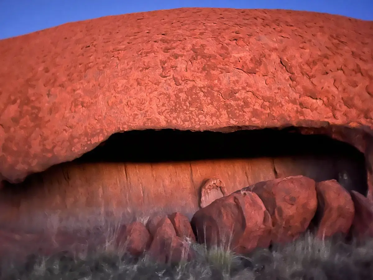 Close-up of a cave at Uluru showing the pitted and textured sandstone surface