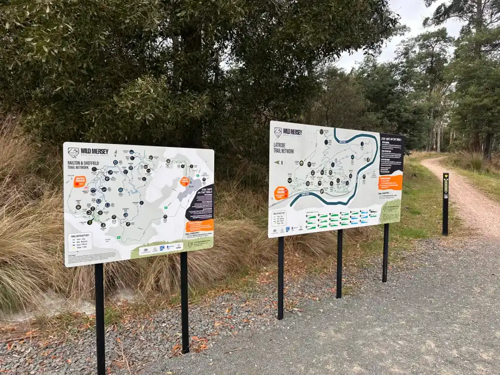 Trail map signboards showing all three Wild Mersey networks